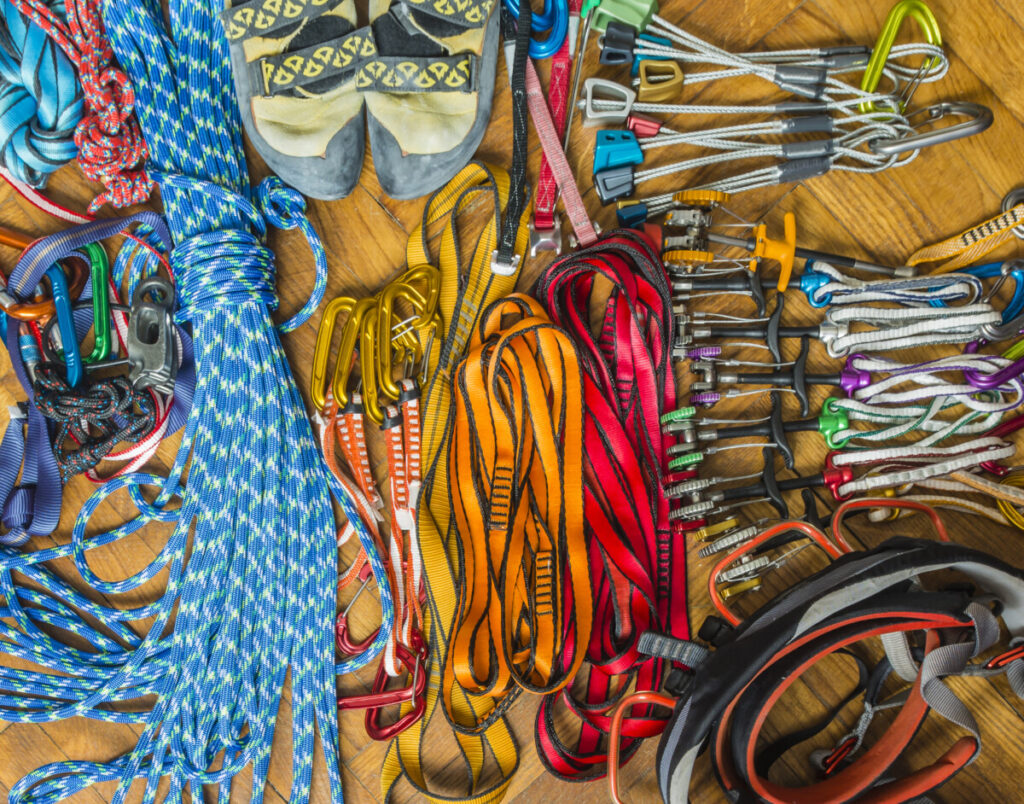climbing-gear-rope-harness-carabiners-slings-cams-nuts-shoes